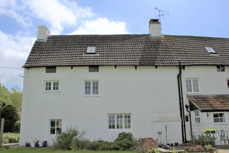 The rear of the house with cheese vents visible just below roof line