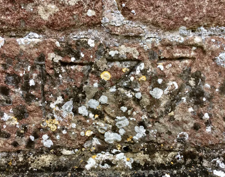Inscription at the base of the north side of the tower