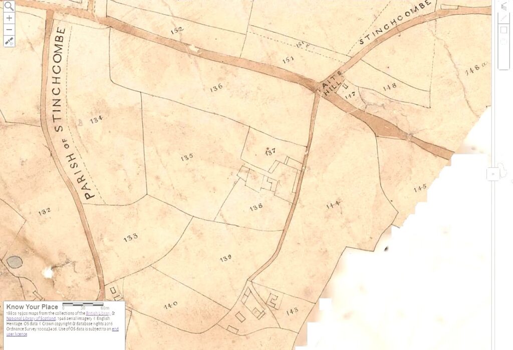 Old cadastral map showing Parish of Stinchombe with numbered land plots 132–140 and a cluster of buildings near plots 136–137, by a main road intersection.