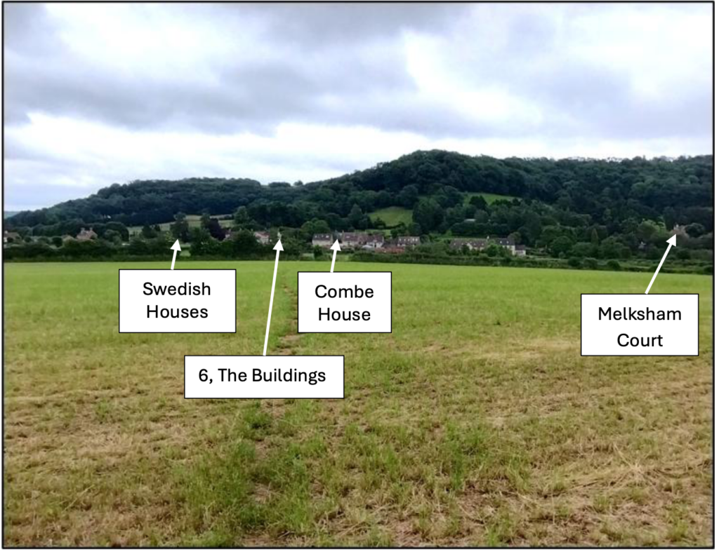Wide rural field with a village at the foot of a forested hill; arrows label Swedish Houses, Combe House, The Buildings (6), and Melksham Court.
