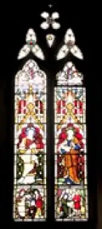 Two tall stained-glass windows depicting saints and angels in bright colors, set in a dark church interior.